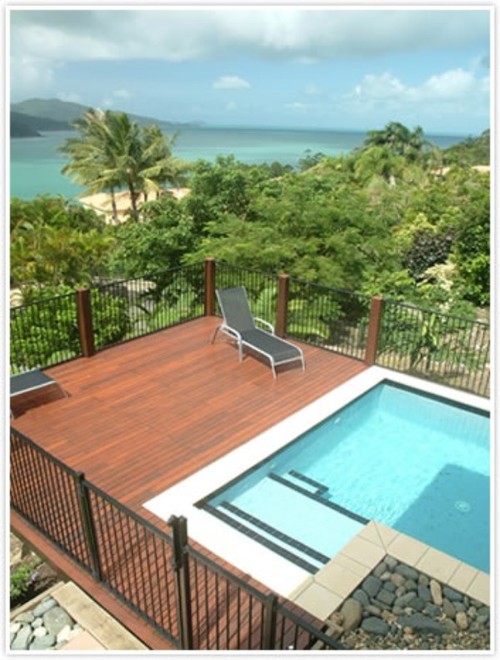 Take in the sun by the pool at your Whitsunday Views villa, while watching the Yachts sail in the distance... - Hamilton Island Audi Race Week 2012 Accommodation Options © Kristie Kaighin http://www.whitsundayholidays.com.au